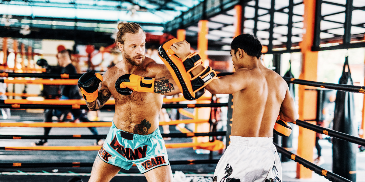 mma-fighters-practicing-in-ring
